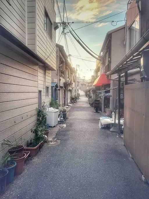 Апартаменты 旅家 Kanzakigawa Осака