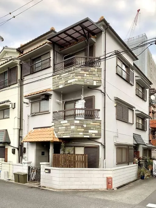 Апартаменты 旅家 Kanzakigawa Осака